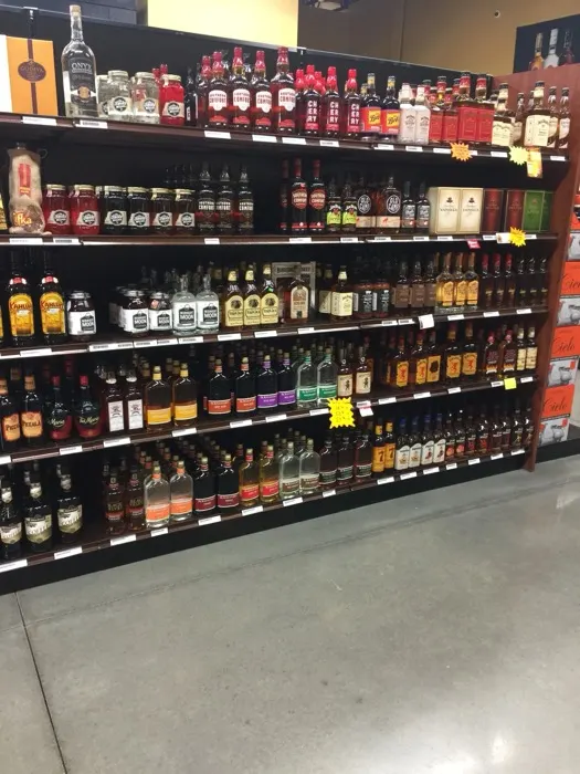 Flavored whiskey and liqueur shelf at Regal Marketplace