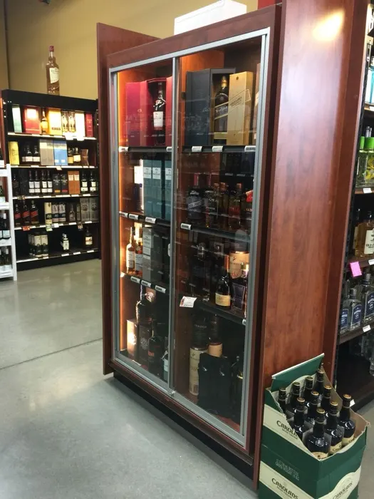Premium spirits display case at Regal Marketplace