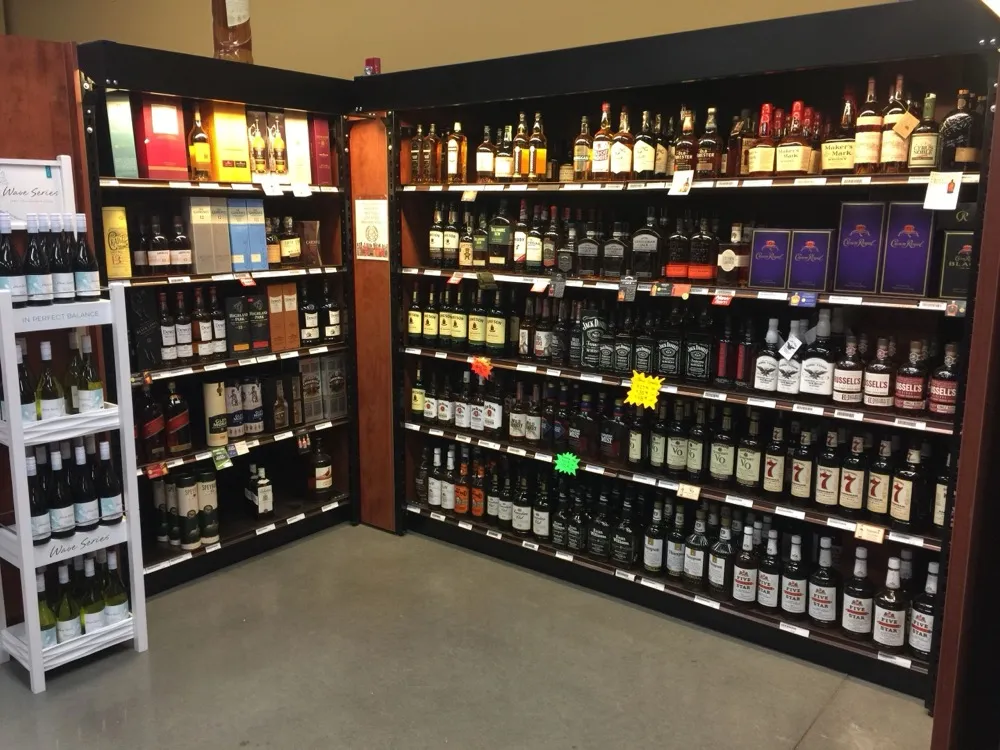 Whiskey and bourbon shelves including Jack Daniel's, Crown Royal and Maker's Mark at Regal Marketplace